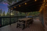 NEW! Luxury Cabin W/Deck, views & Playground! Pool, Slots, Fun, Snow !