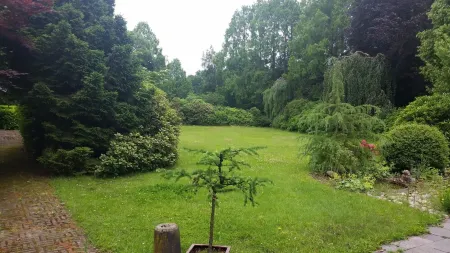 Morning sun vacation apartment in a country house with a magnificent garden Отели в г. Вестерштеде