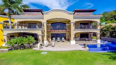 Stunning Luxury Mansion in Playa Flamingo with Six Bedrooms and Beachfront Access Hotels in 