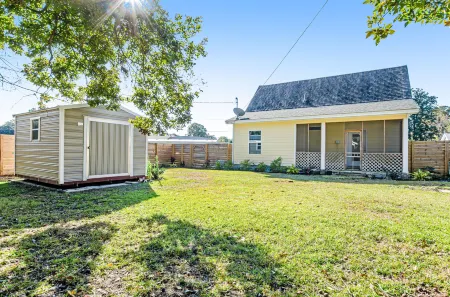 Dog-friendly oasis with central AC, patio & fenced yard - walkable location