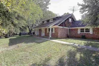 Charming Retreat with Spacious Yard and Scenic Patio - Inviting Getaway