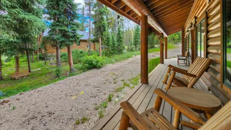 Spacious Deck by Year-Round Creek - Charming Blue River Cabin