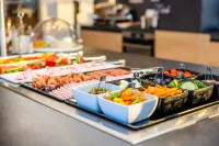 harry's home Steyr hotel & apartments - Desayuno