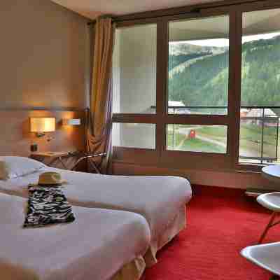 SOWELL HÔTELS Le Pas du Loup Rooms