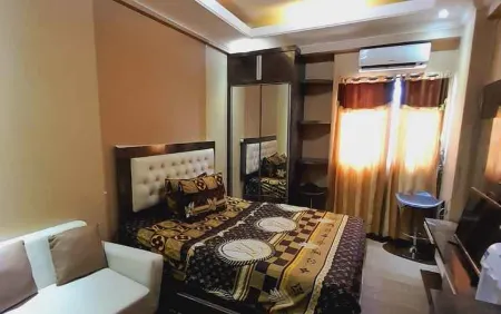 Apartment Studio The Suites Metro by Rusdi Kingpro Отели в г. Buahbatu