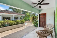Stylish Home with Chic Decor, Luxury Amenities & Tropical Outdoor Oasis with Sparkling Private Pool