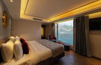Divine Lake Cruise Hotels near Bharadi Temple