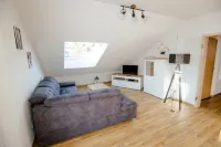 Modern and bright vacation apartment with Hutewald view
