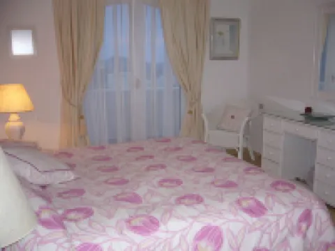 Villa with stunning views,easy access to swimming pool/ beautiful gardens. A/Con