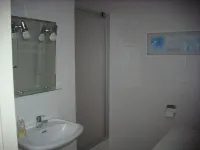 Ameland - apartment with balcony to the south side with a view of meadows and the village of Buren Hotels in Buren