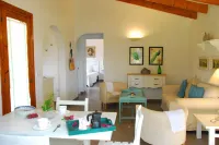 Casa Barregas. Unifamiliar en Cap D'Artrutx, Menorca. Casa con jardín.