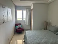 Apart de Luxo de frente para a PRAIA DO MORRO! 4 suítes, 3 vagas, ar cond, WIFI