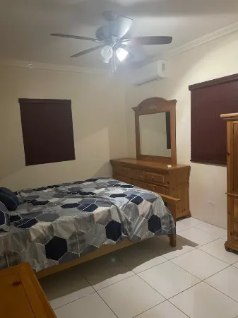 A Cozy Apartment Sitting on a Hill.