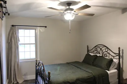 Snuggle up and relax with the whole family at this Ava home.