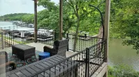 Lake Front Home with Boat Slip and swim platform dock