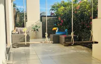 Bright 2BR Condo w/ Pool, Walk to Beach + Downtown