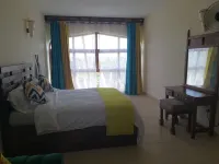 Beachfront studio apartment in a diani beach area with a 180 degree ocean views. Hotels in Kwale