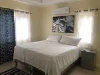 Beachfront Bliss in Portmore 2BR with Ocean Views & Modern Comfort, pool access