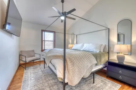 Lakefront Home & Guest House with Two Docks, and Breathtaking Mountain Views!