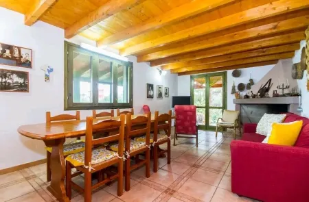 Cottage surrounded by greenery ideal for families