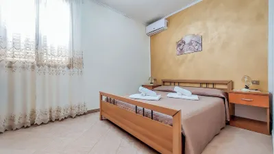 Villetta Margherita - A few steps from the sea of Cala Pisana Hotels near Rabbit Beach