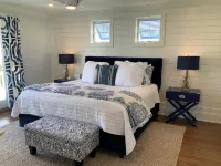 Beautiful new home, professionally decorated with pool close to town and beach