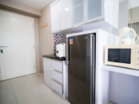 Modern and Homey Studio at Tanglin Supermall Mansion Apartment By Travelio Hotels in Sambikerep