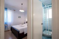Corfu Glyfada Menigos Resort 86 - Airport Shuttle