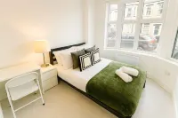 Stylish 1BR Ground Level with Private Patio Garden - Condos