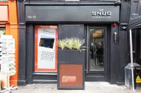 The Snug Townhouse Hotels near Circle of Life Commemorative Garden