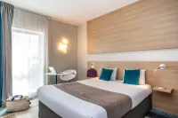 Hôtel Kyriad Le Mans Est Hôtels à proximité de : Abbaye Royale de l'Épau