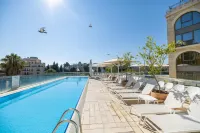 Grand Court Hotel - Airport Shuttle