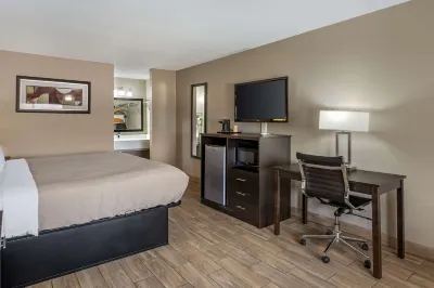 Quality Inn & Suites Hotels near County Line Holiness Church