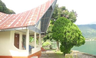 Tuk Tuk Timbul Bungalows