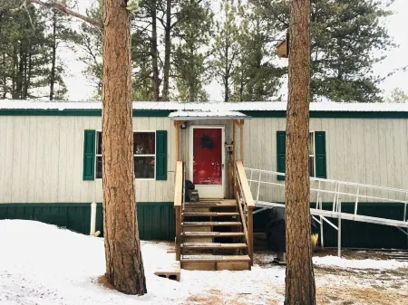 Secluded CO retreat featuring a swim spa, hiking trail and stocked kitchen!