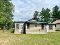 Waterfront Cabin w/ Private Dock & Outdoor Bar near Munising/Manistique