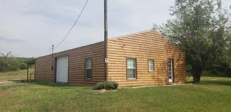 Modern Log Cabin with indoor and outdoor jacuzzi tubs