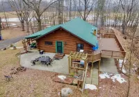 Beautiful Log Cabin 11ac. 4 br. 2.5 ba. on snowmobile trails in Manistee forest.