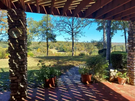 Rir: E Faye Jones Style Rock Floor to Ceiling in 3 Bathrooms Open Floor Plan.