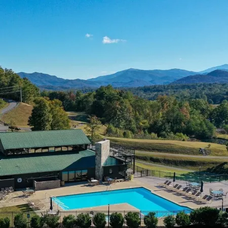 A Luxury Cabin with panoramic mountain views and 3 King Ensuites and Hot Tub!