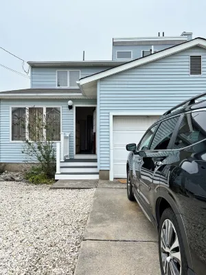 Steps from the beach! Come sail away!