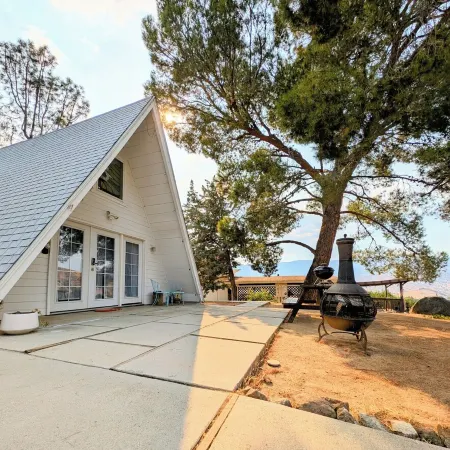 Cozy 1960s A- Frame with Mountain Views