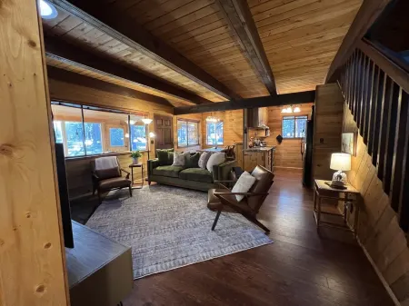 Wooden A-Frame Cabin Nestled in the Tall Pines