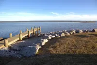 (Fishing from dock) Boat launch, seafood market & bait-tackle shop next door....