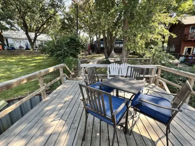Charming Lake House Retreat with Private Dock & Expansive Covered Porch