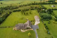 Gorgeous Home featuring an Indoor Heated Pool, Gourmet Kitchen & Outdoor Spaces