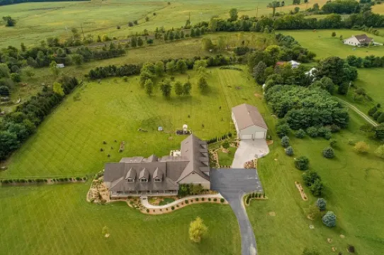 Gorgeous Home featuring an Indoor Heated Pool, Gourmet Kitchen & Outdoor Spaces