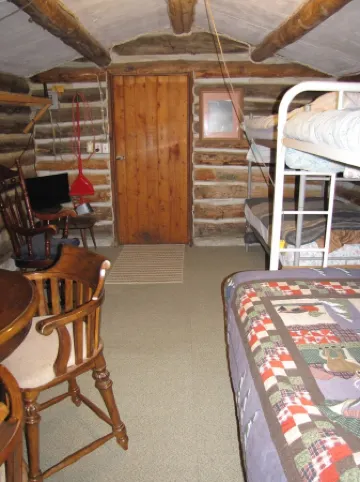 Cozy rustic cabin on Little Sheep Creek at foot of Lima Peaks