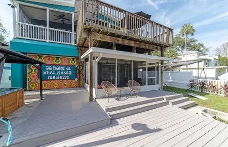 River Home with Huge Arcade, Hot Tub Kayaks, Mini Golf and Floating Pad, 80in TV