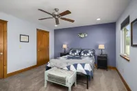 Lake view house with expansive views, fireplace, walk in showers, Ember mugs.